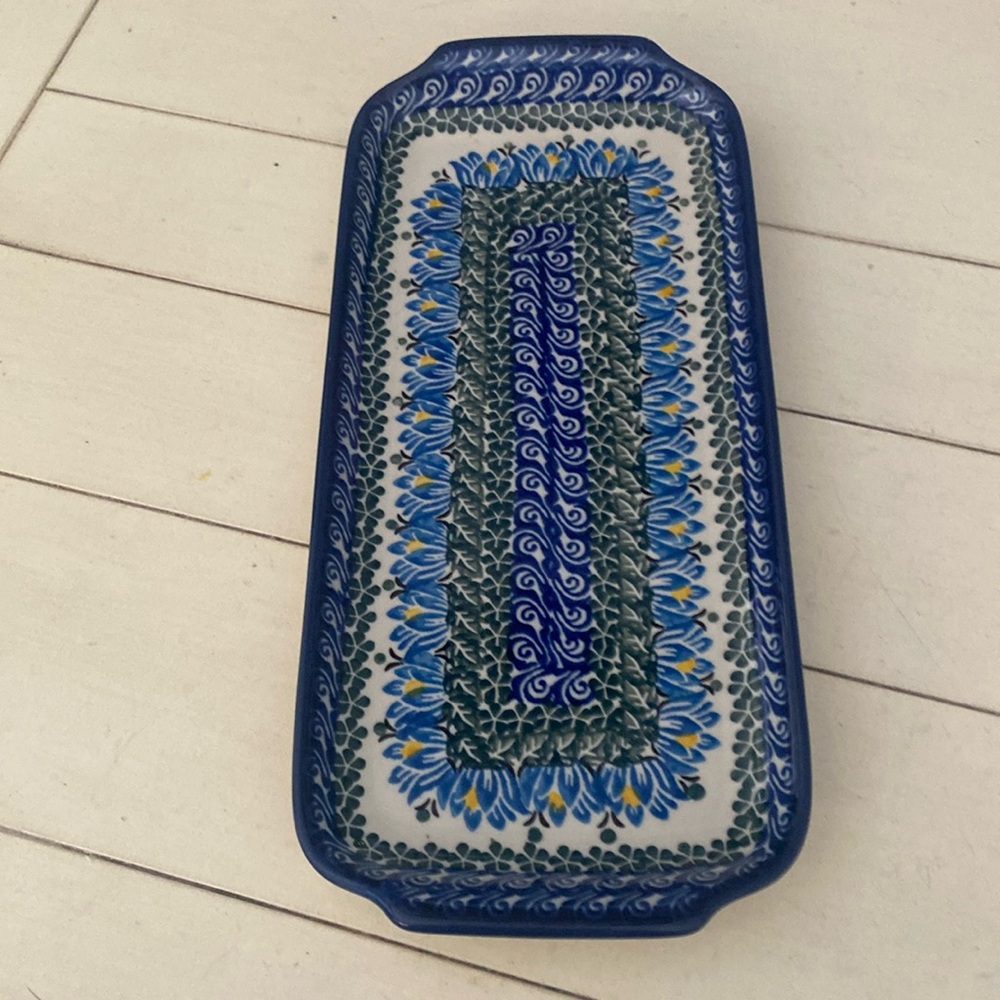 I okay hand painted bread or snack tray.